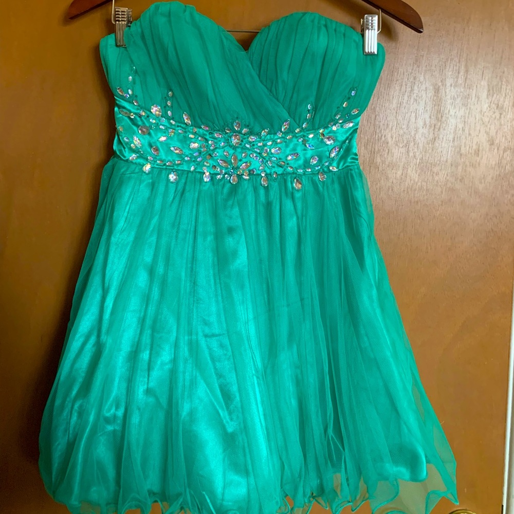 Mini party dress, worn once. Teal color. Beautiful and comfortable!!